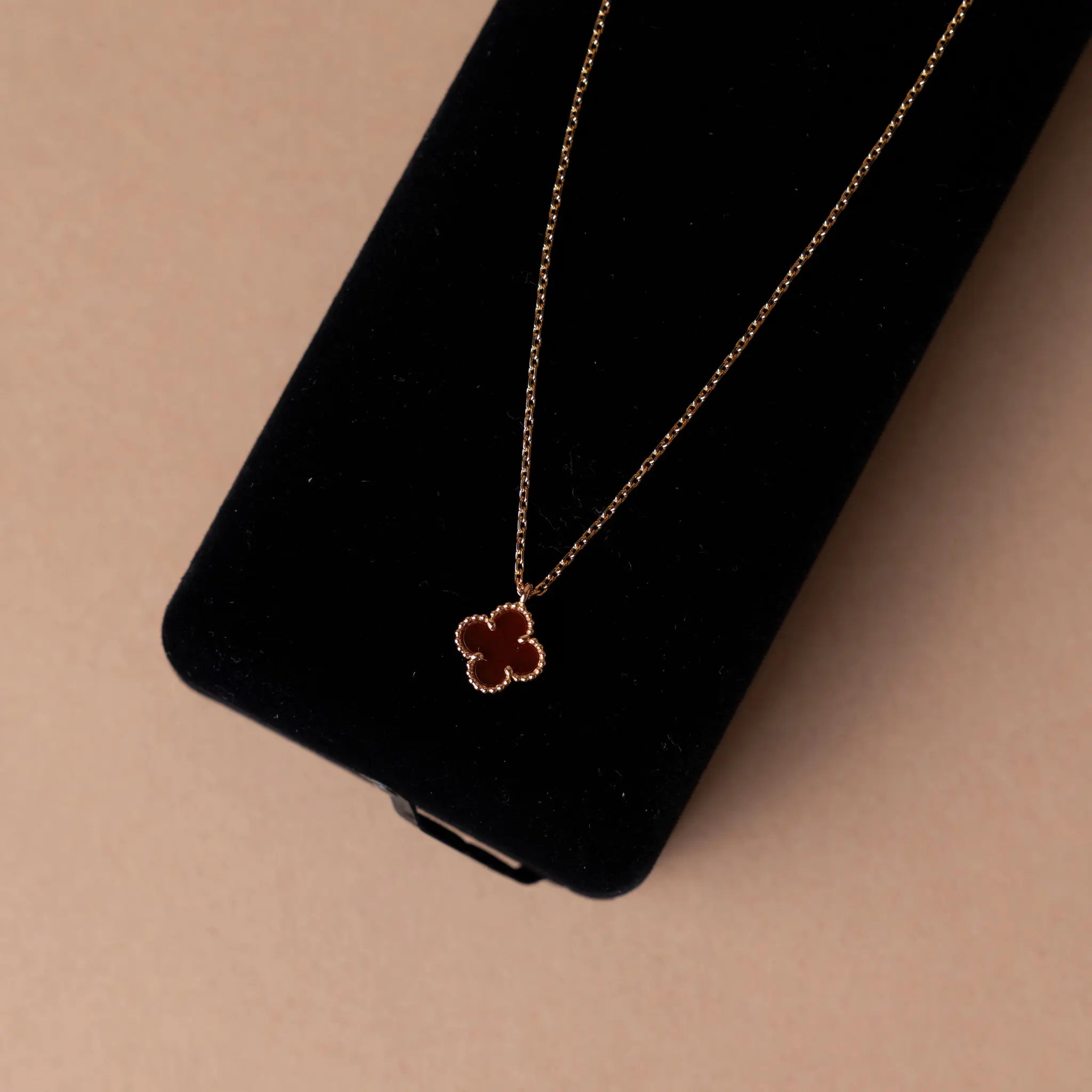 Van Cleef and Arpels 18K Yellow Gold Carnelian Sweet Alhambra Pendant Necklace — Interior Detail